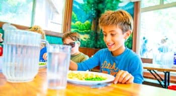 A camper eating lunch