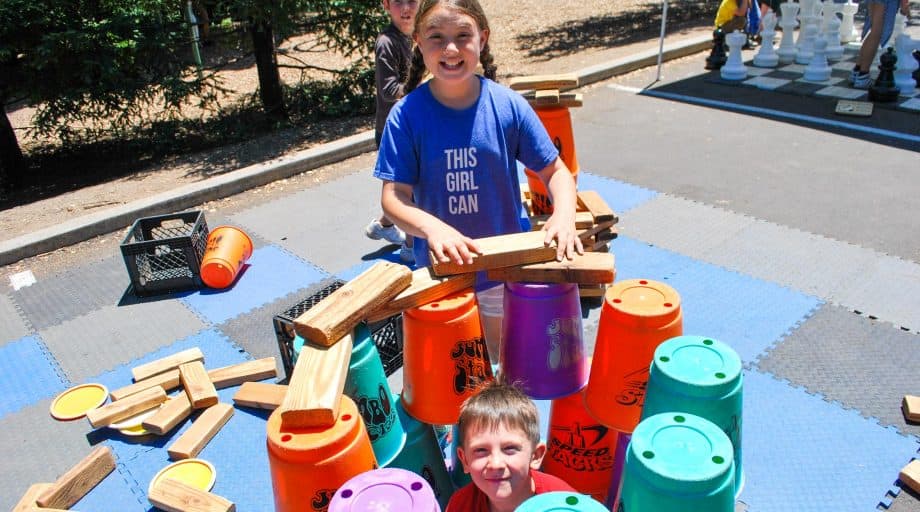 Day campers stack giant cups