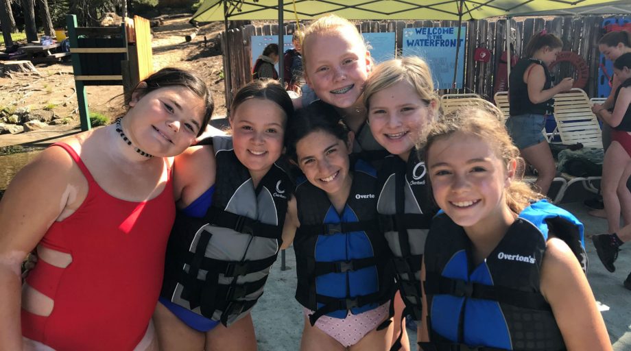 Girls smiling after a day in the water