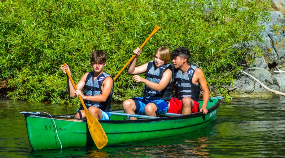 Boys on a canoe