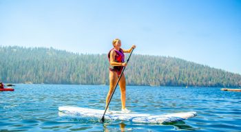 a girl paddleboarding